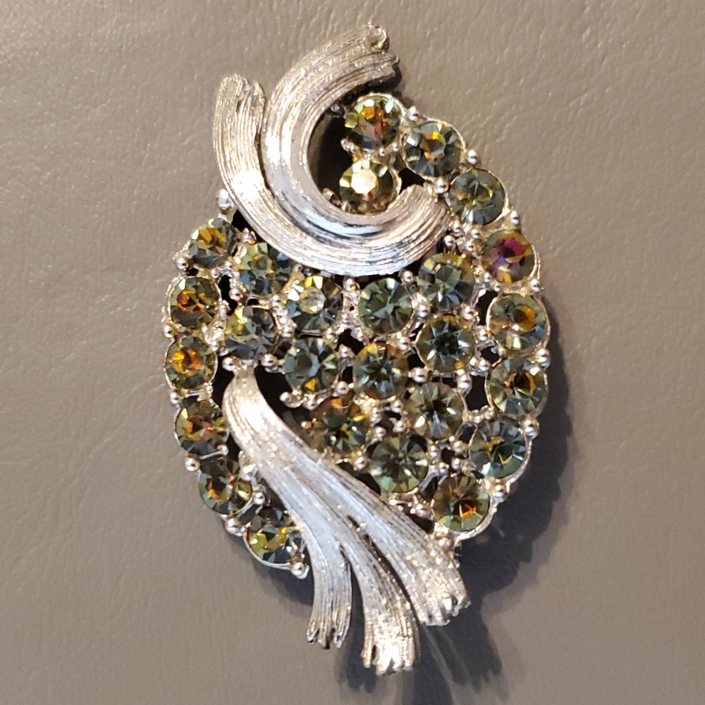 Brooch Silvertone with green/amber rhinestones